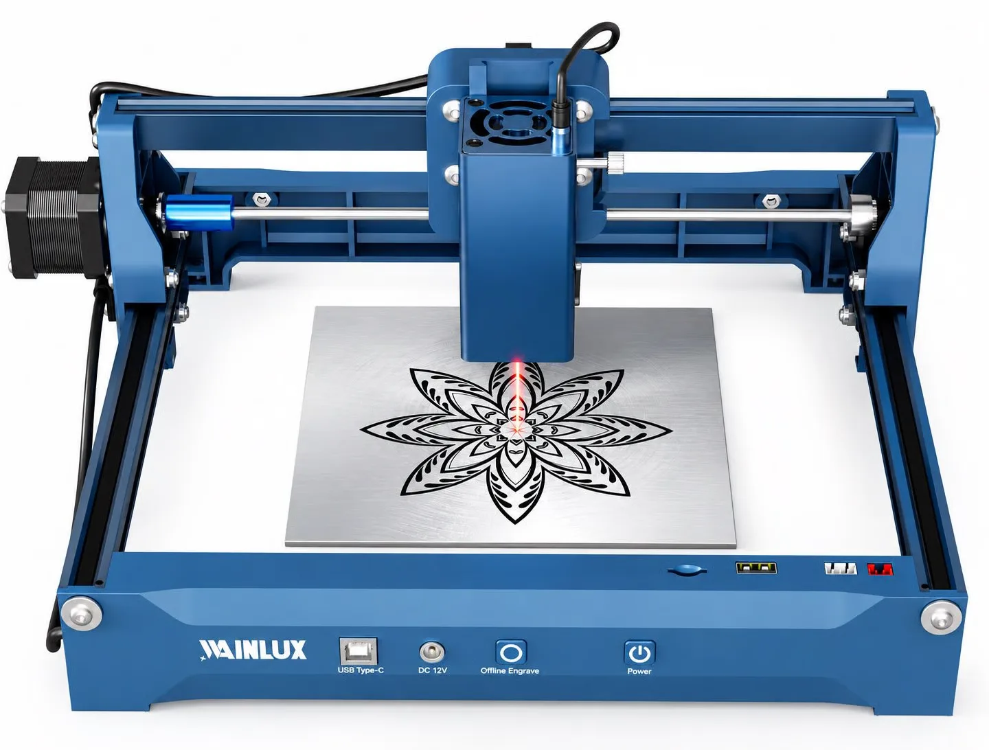 WAINLUX X1 commercial laser engraver marking a decorative pattern on a metal plate