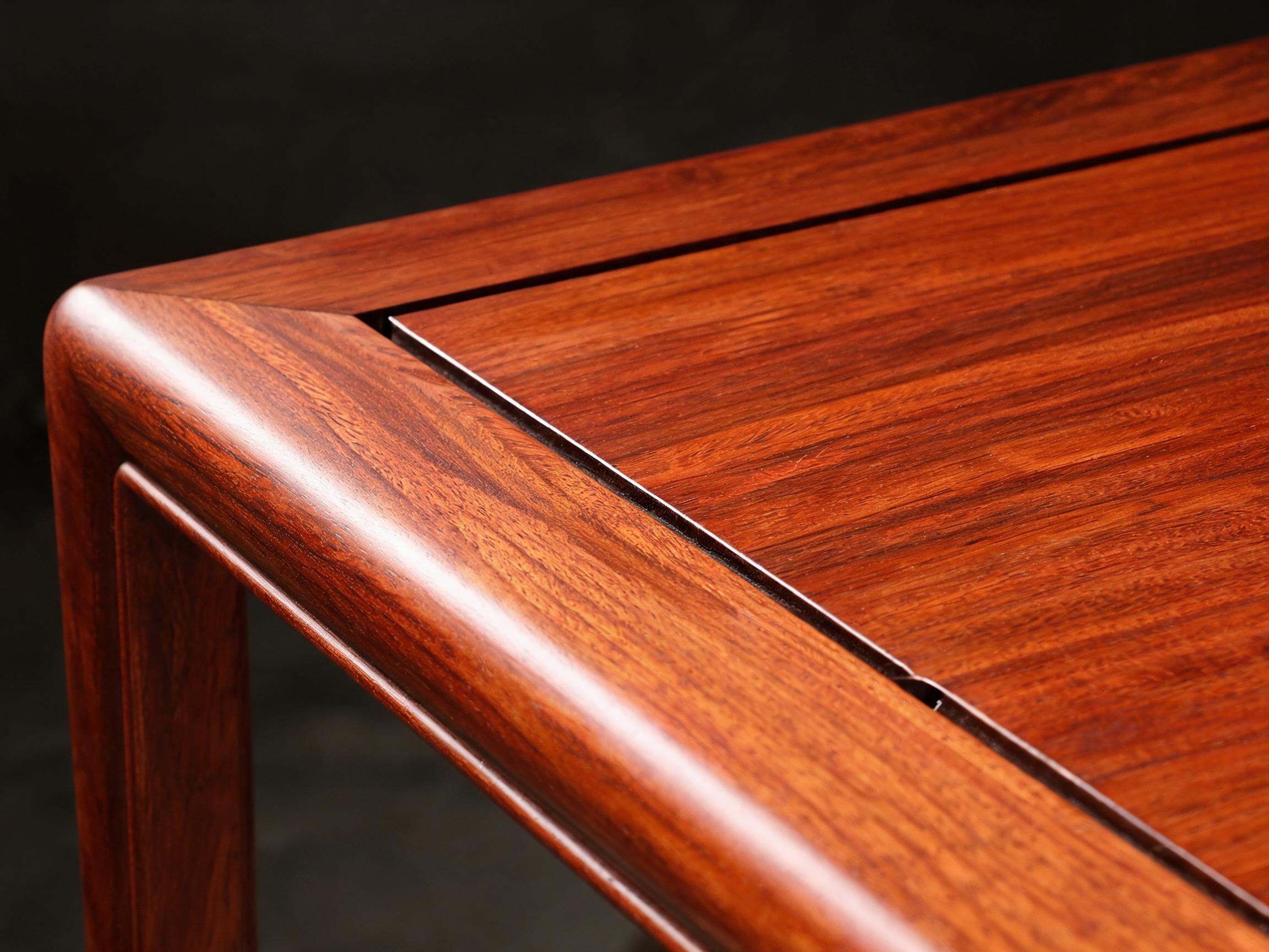 Floating tabletop panel seated in the frame groove with a 4 mm expansion gap on the Siamese rosewood tea table