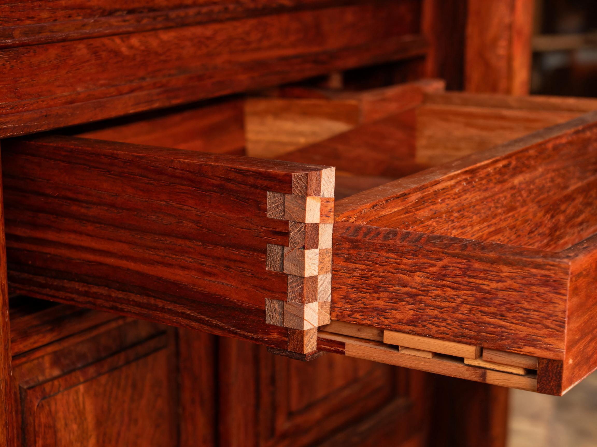 Hand-cut through-dovetail drawer joint detail on Siamese rosewood sideboard