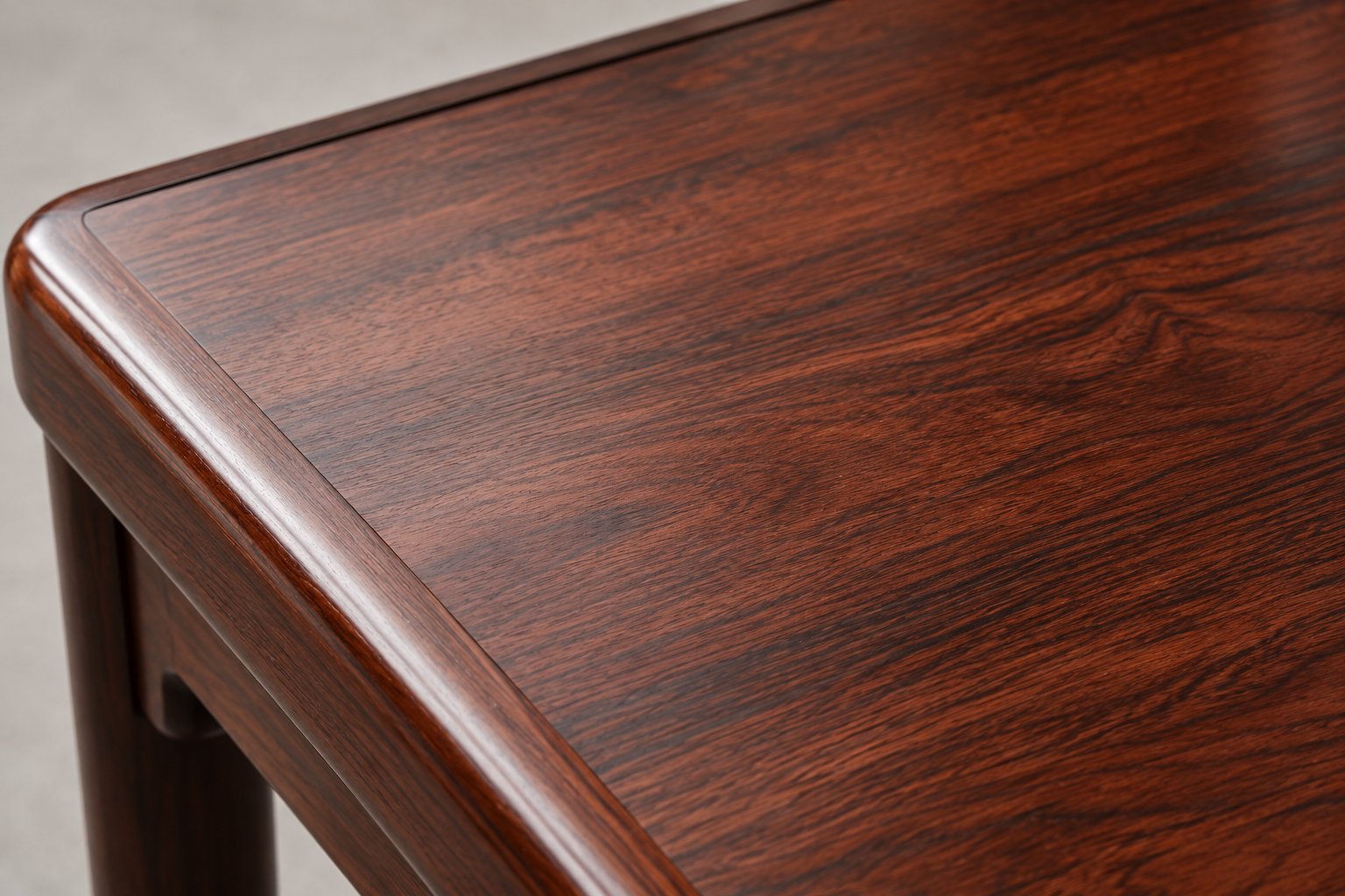 Hand-rubbed raw lacquer satin surface showing natural straight and wavy grain on Siamese rosewood