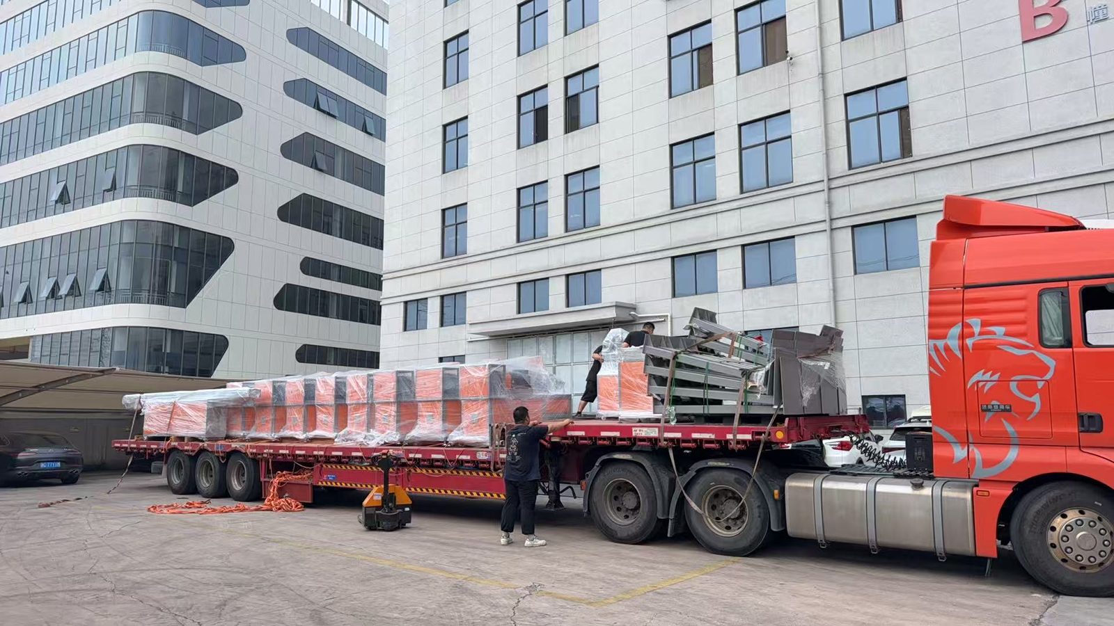 Equipment loaded and secured on a truck for delivery