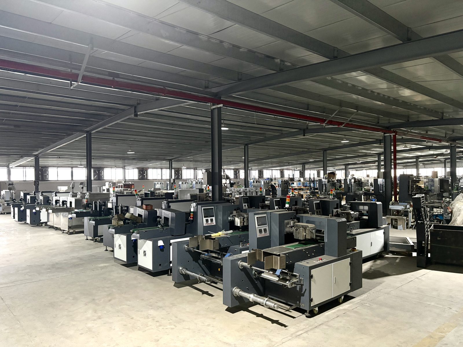Production workshop with rows of machines at the Wenzhou production base
