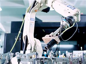 Laser welding robot on the production floor at ChunTian sheet metal fabrication facility